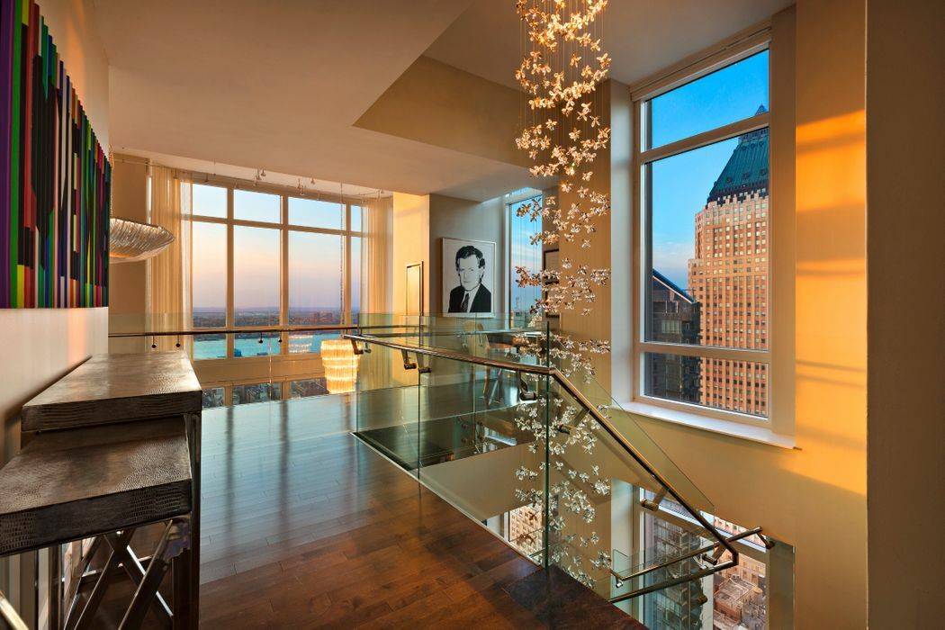 Dramatic and voluminous penthouse with 25 foot ceilings and the best sunset views the city has to offer !