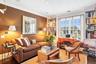 Office space with dark wood-type flooring, ornamental molding, and recessed lighting