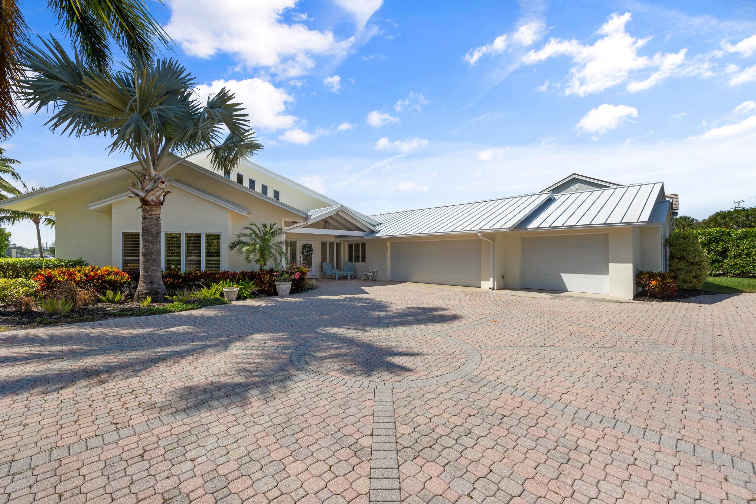Summertime retreat on the Loxahatchee river, boasting panoramic wide water views and convenience of location by land and sea !
