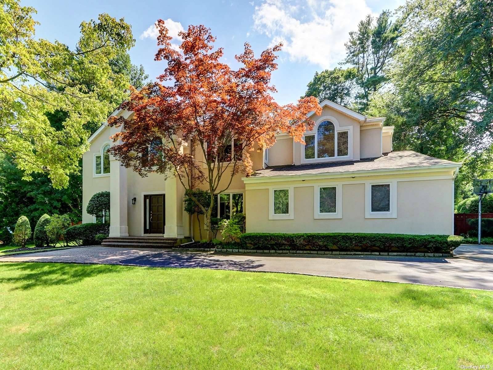 Welcome home to a spacious Center hall Colonial, a 6 bedroom, 3.