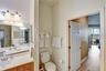 Primary bath enternce from bedroom.