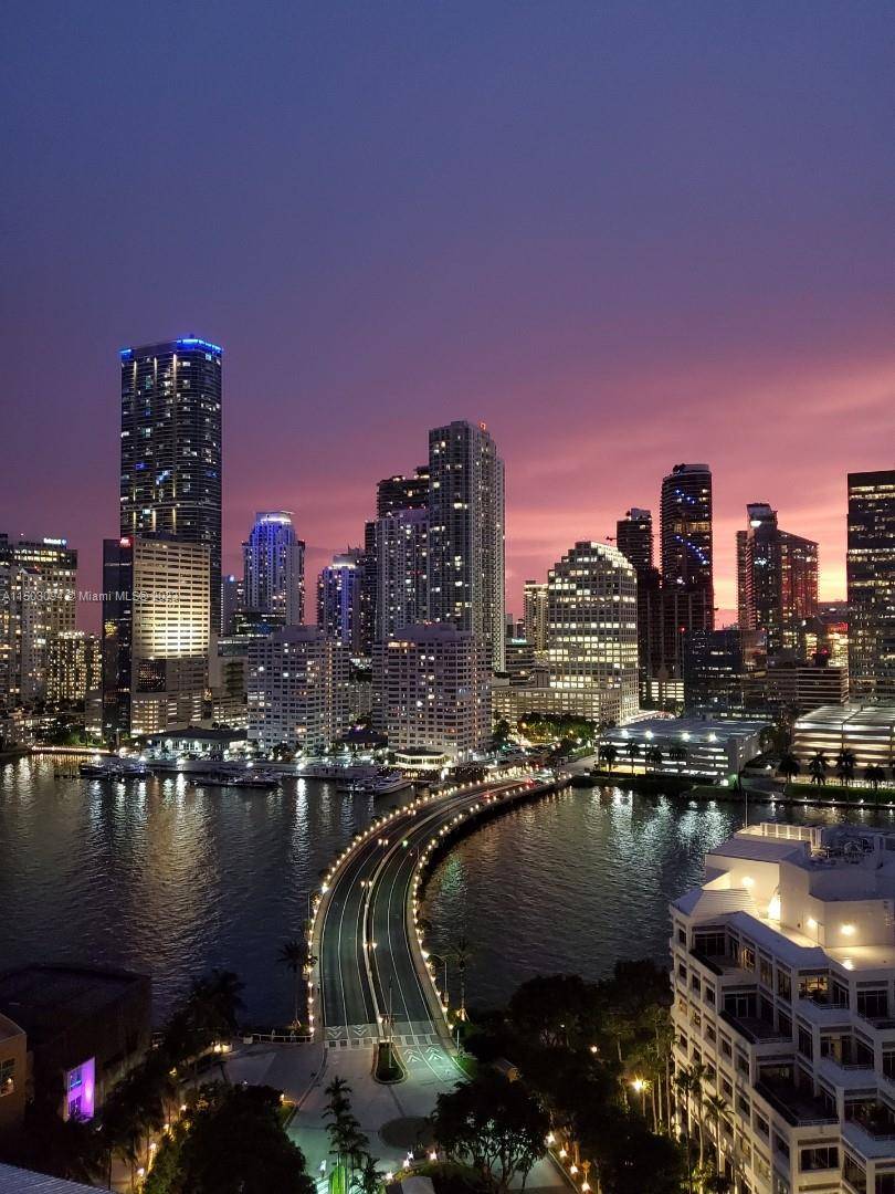 LUXURIOUS 2 2 on Brickell Key with stunning views of the bay and Miami's skyline, meticulously remodeled condo, offering a chic and modern resort lifestyle in the heart of Brickell, ...