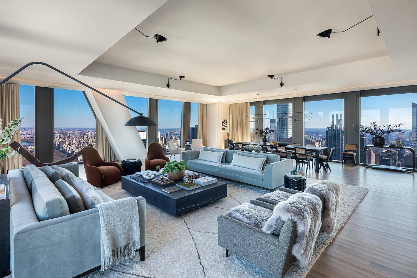 Balancing grand scale living with the intimate feeling of home, Residence 58B at 53 West 53 comprises 3, 251 square feet, offering three bedrooms, three and a half bathrooms, and ...