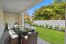 *virtually staged, 1st floor back porch and yard