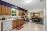 Numerous cabinets, double stainless steel sink and the newer oven will delight the home's chef