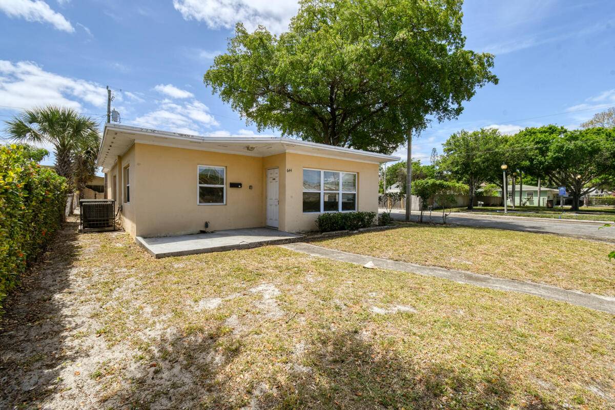 Located near the Northwood Community and Downtown West Palm Beach, this charming 3 bedroom, 2 bathroom home boasts LVP flooring and tiled interiors throughout.