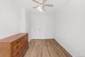 Spacious bedroom #3 with new luxury vinyl flooring and freshly painted.