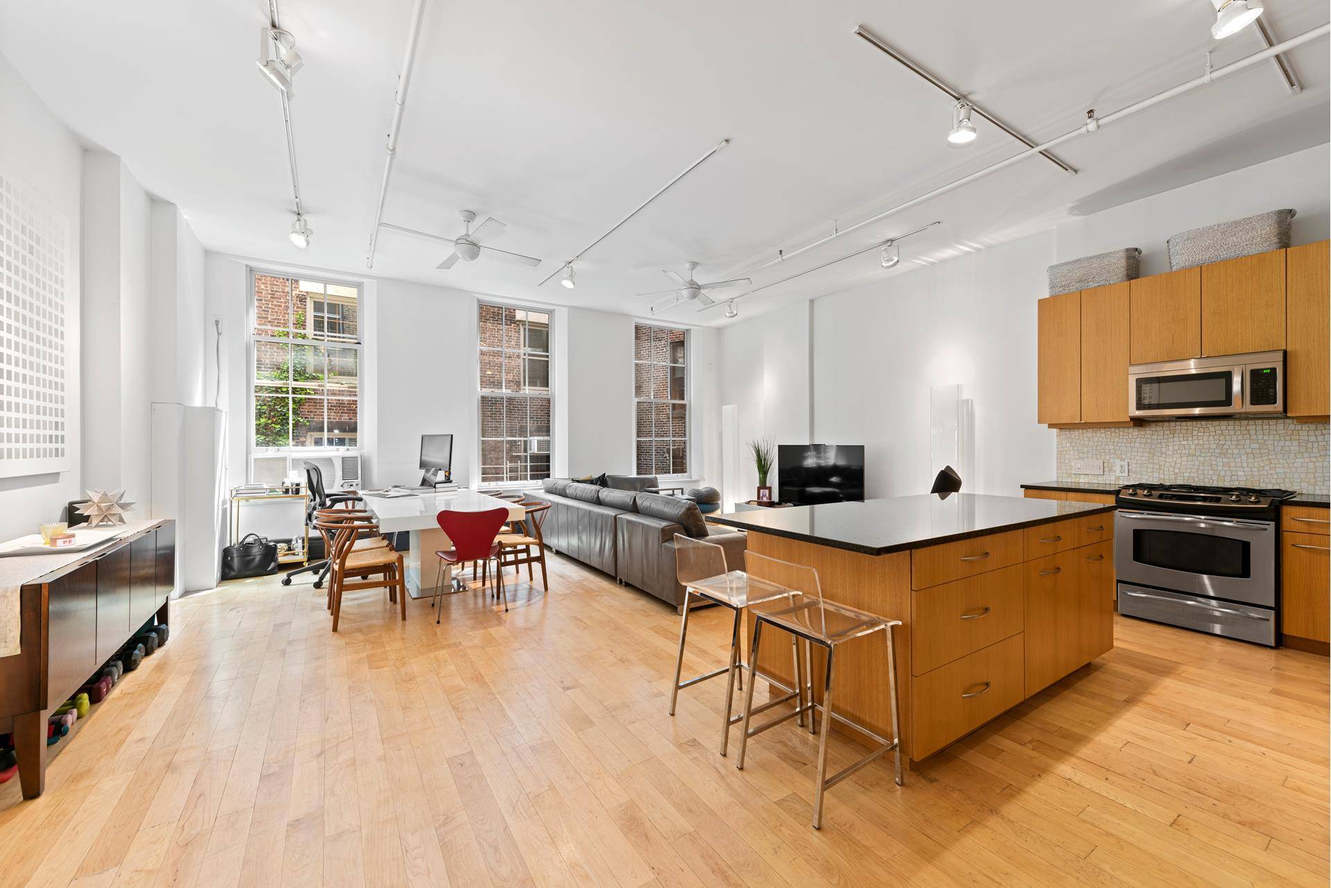 Fully renovated 1, 400 square foot loft with high ceilings and exposed brick in the historic, four unit building 182 Duane Street, located across from Duane Park on the most ...