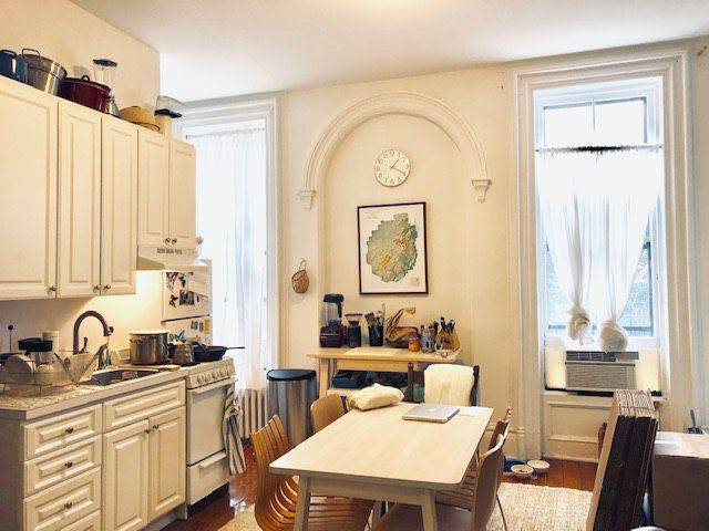 2 R is a One of a king beautiful parlor floor apt featuring extra high ceilings and tons of charming.