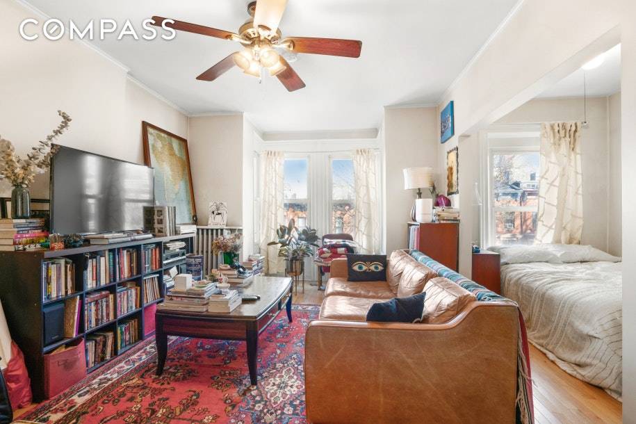 This sun kissed top floor floorthrough offers space, convenience, and tasteful updates.