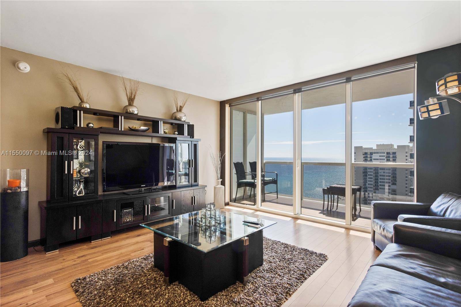 Immerse yourself in breathtaking ocean views from this 21st floor studio apartment featuring a queen bed.