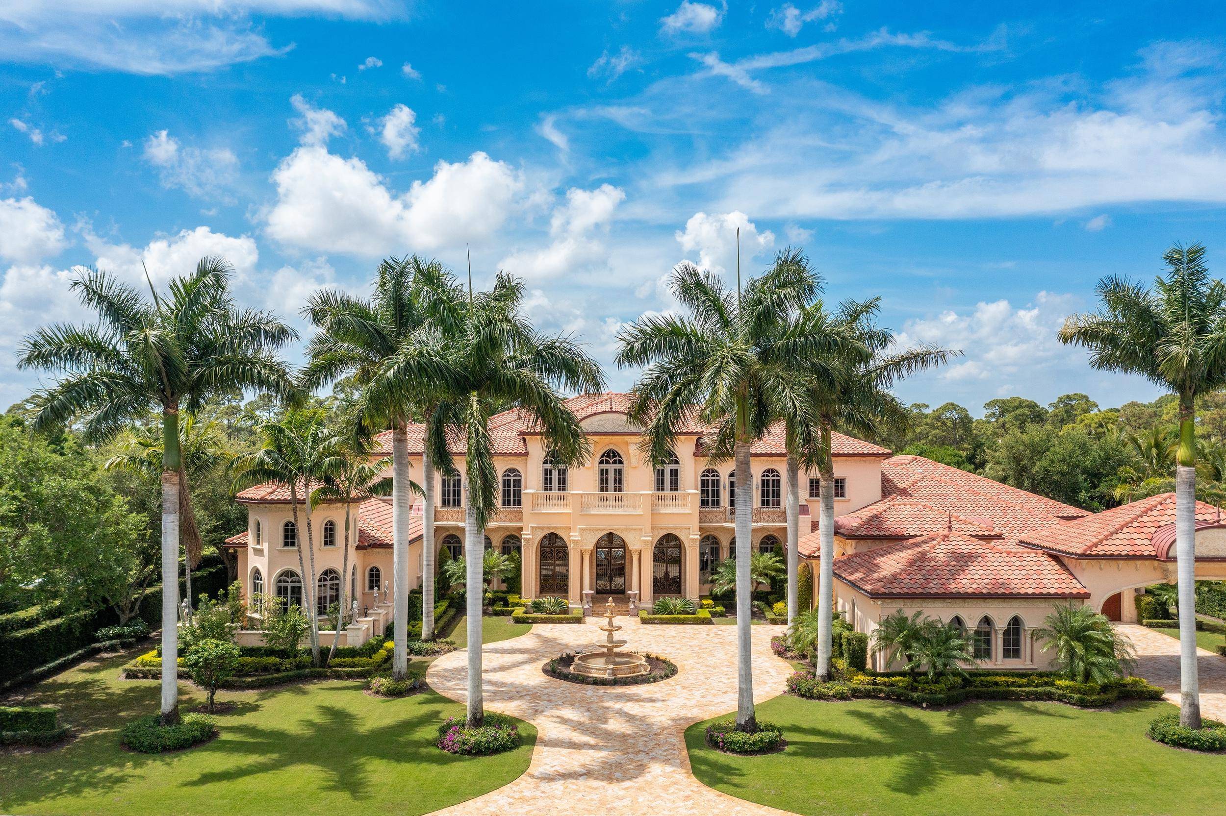 Few residential properties complement their natural surroundings quite like this epic, Mediterranean style masterpiece, seamlessly tucked into a storied slice of South Florida.