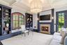 Built-in Book Shelves | Gas Mantled Fireplace