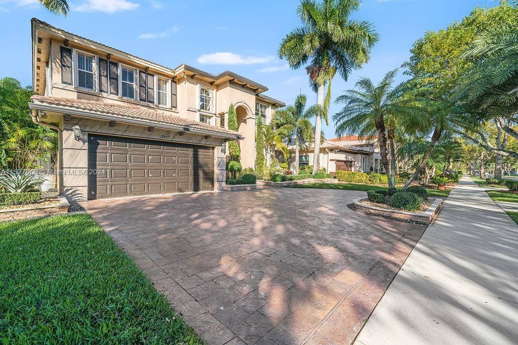 Breathtaking, 2 story home in the sought after, gated community Monarch Lakes.