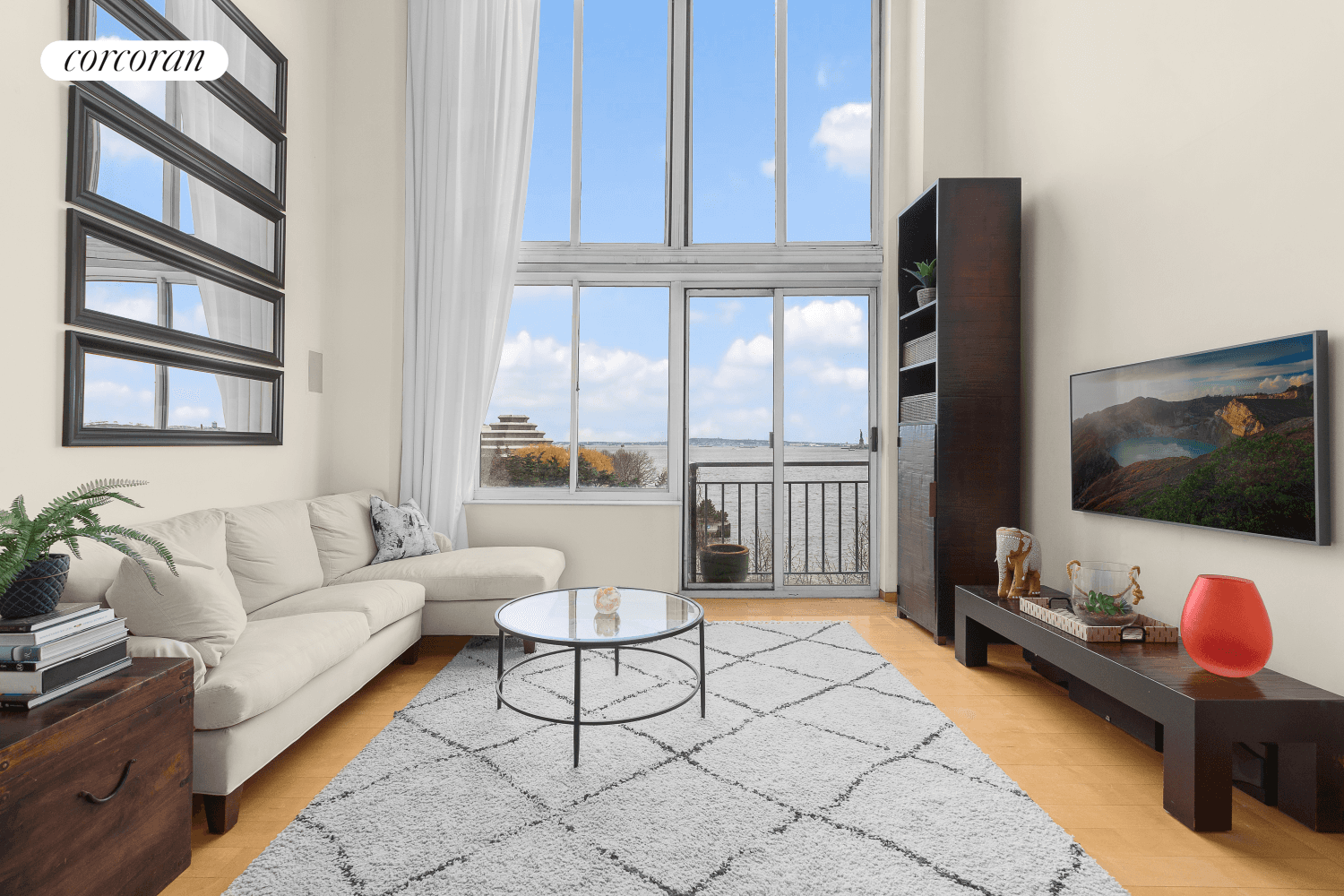 Located at 21 South End Avenue, this sprawling designer 2 BR 2.