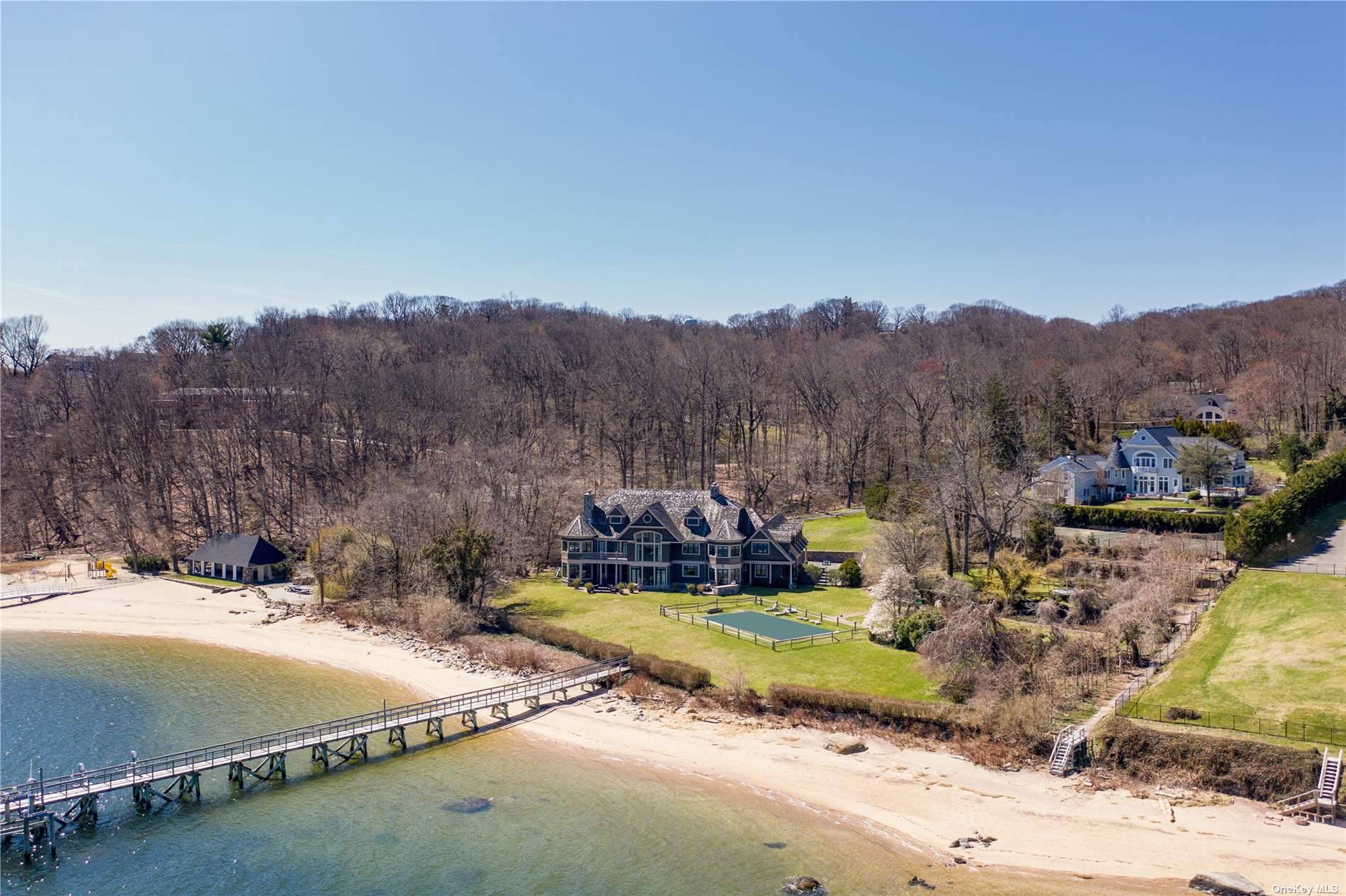 Welcome to 263 Harbor Acres Road, a beautiful 6 bedroom and 7 bathroom Hamptons style shingle home built in 2004 on over 4 acres of prime waterfront land in the ...