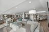 The Club Room offers a full kitchen, seating and dining areas, a library and game area.