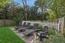 Fenced backyard featuring a patio area