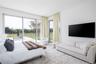 Bedroom featuring access to outside and carpet floors