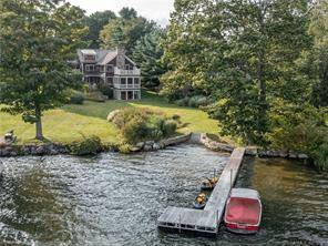 Unique opportunity to own fabulous shingle style house with direct frontage on Lake Waramaug with private dock and walk in beach area.