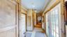 Breezeway Entry - Foyerwith Double French Doors entering and exiting the foyer.