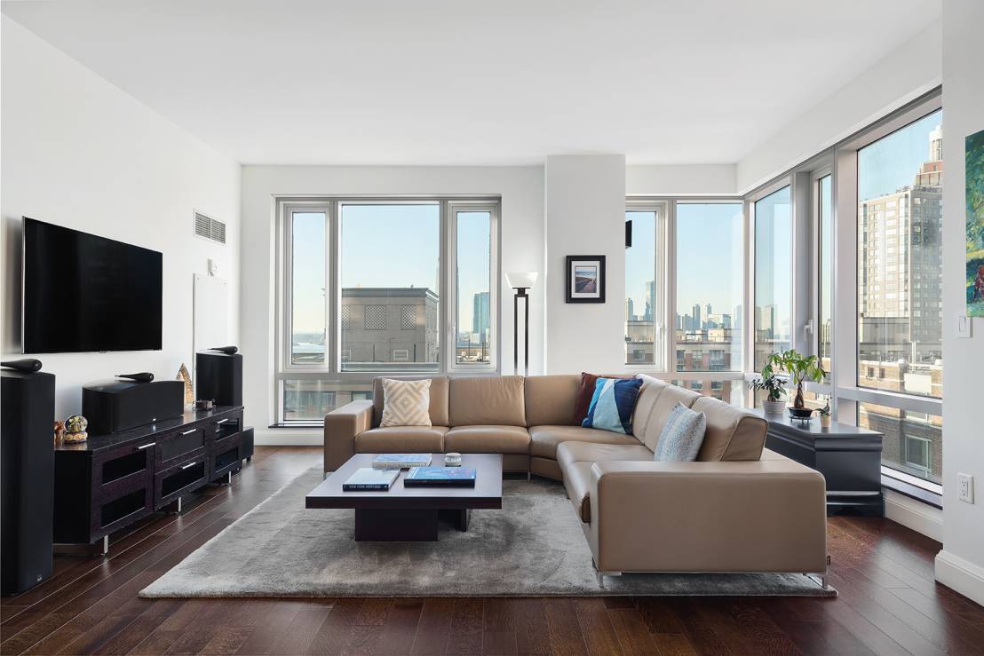 RIVER VIEWS at The Visionaire Clean, contemporary and spacious, apartment 9E offers panoramic views of the Hudson River in a spacious split two bed two bath layout.