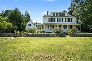 Exquisite 1. 7 acre estate in the heart of Madison !