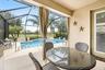 Covered Lanai Overlooking the Pool and Peaceful Pond Views