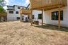 View of yard featuring a patio and a deck