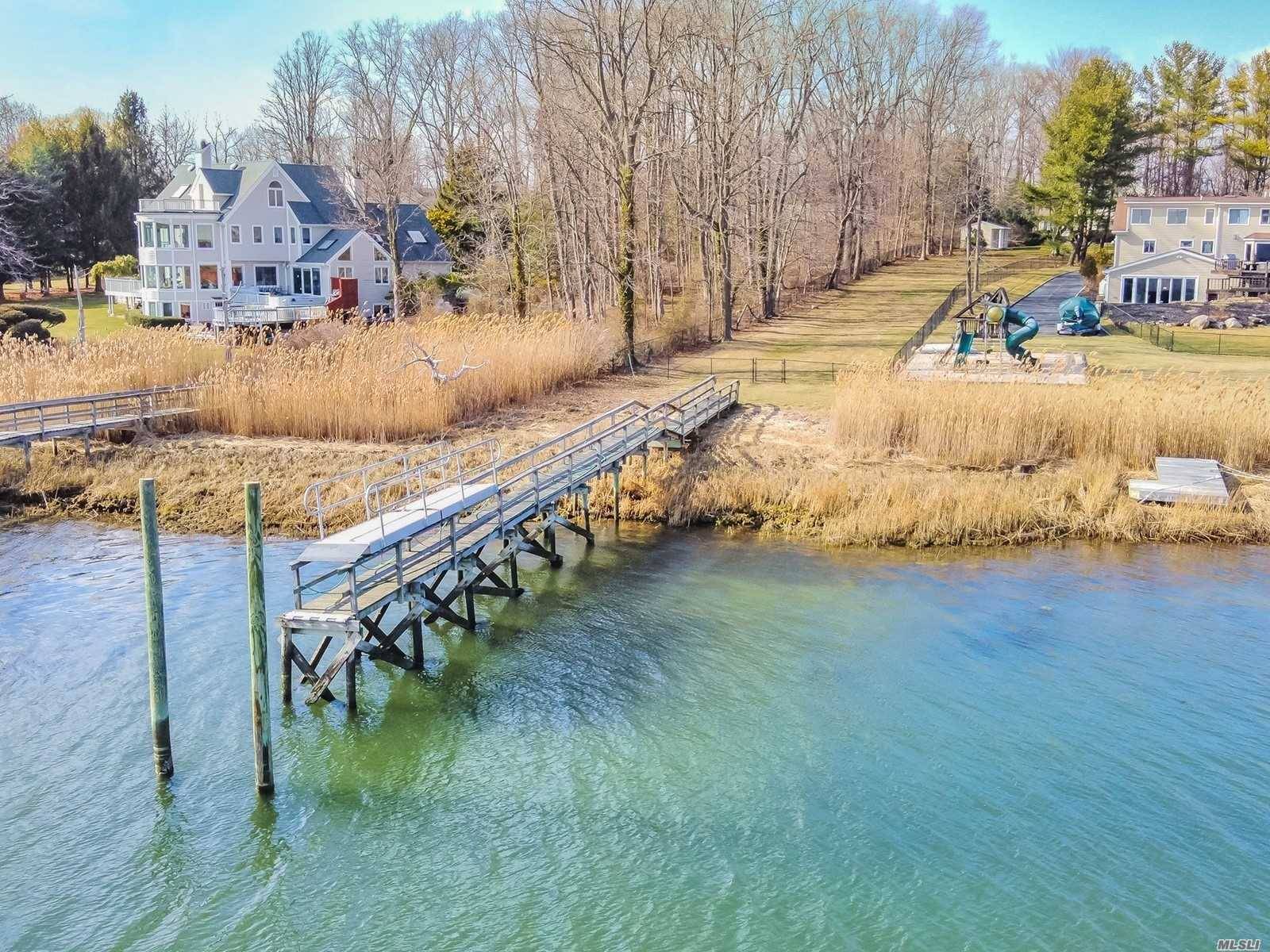 Magnificent 2 Acre Waterfront Colonial !