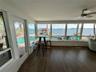 Flexible, bonus space with incredible water views, perfect for a home office or lounge