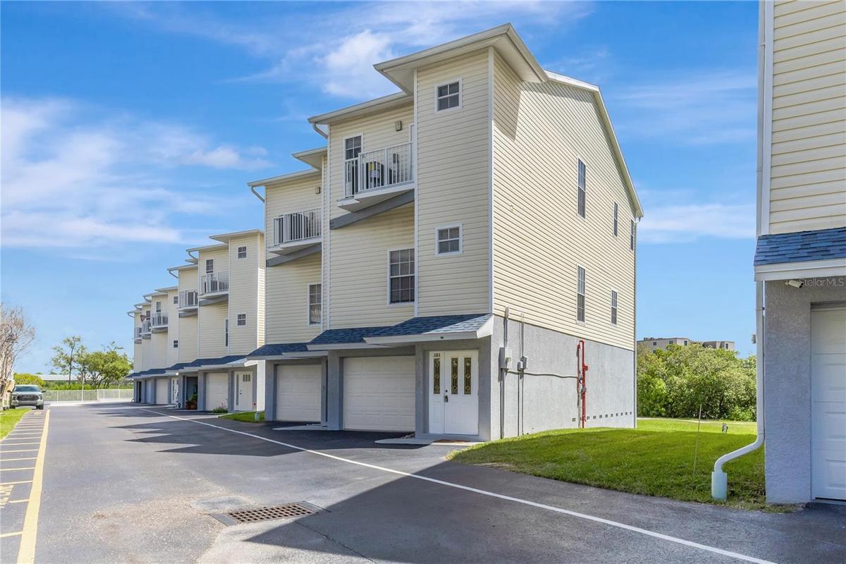 Rare end-unit townhome with water views and direct beach access just steps away.