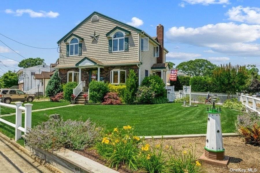 Welcome To This Beautiful Oceanside Colonial.