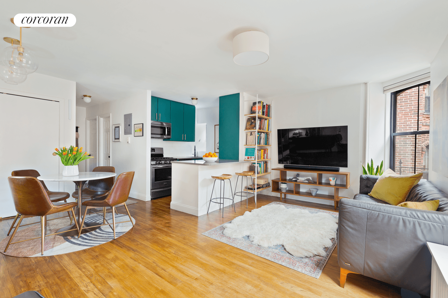 Located in the iconic Cobble Hill Towers, this two bedroom corner unit condo is filled with wonderful features.
