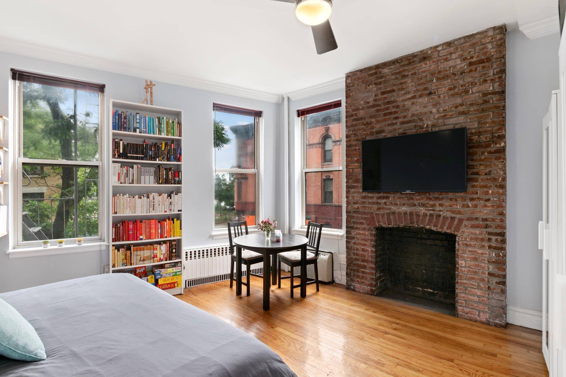 FURNISHED, bright, sunny CO OP corner Alcove STUDIO apartment in the West Village !