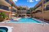 Community pool and hot tub at Playa Encantada