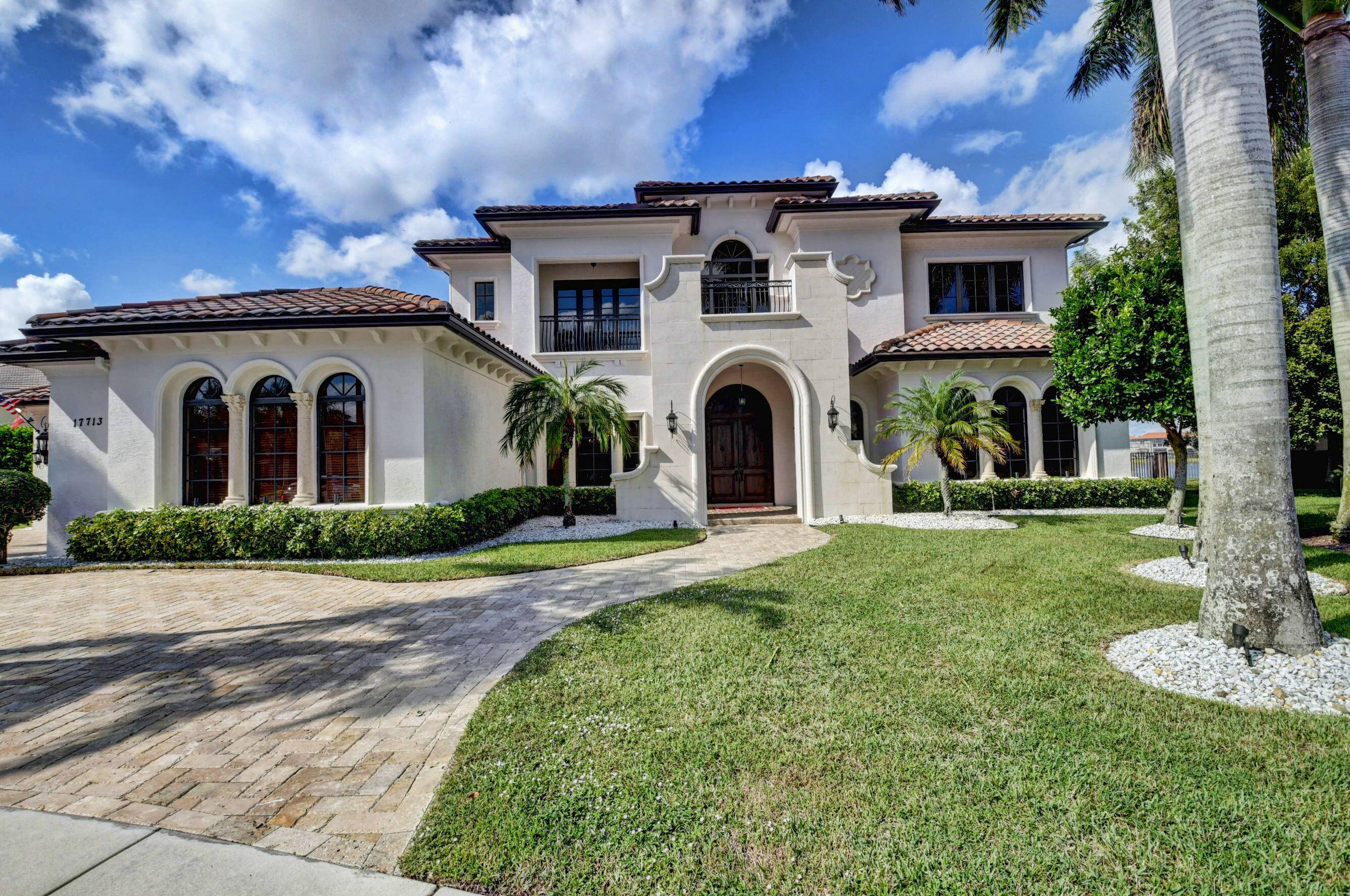AMAZING OPPORTUNITY TO RENT ONE OF THE LARGEST LAKE FRONT CUSTOM ESTATE HOMES IN THE OAKS.