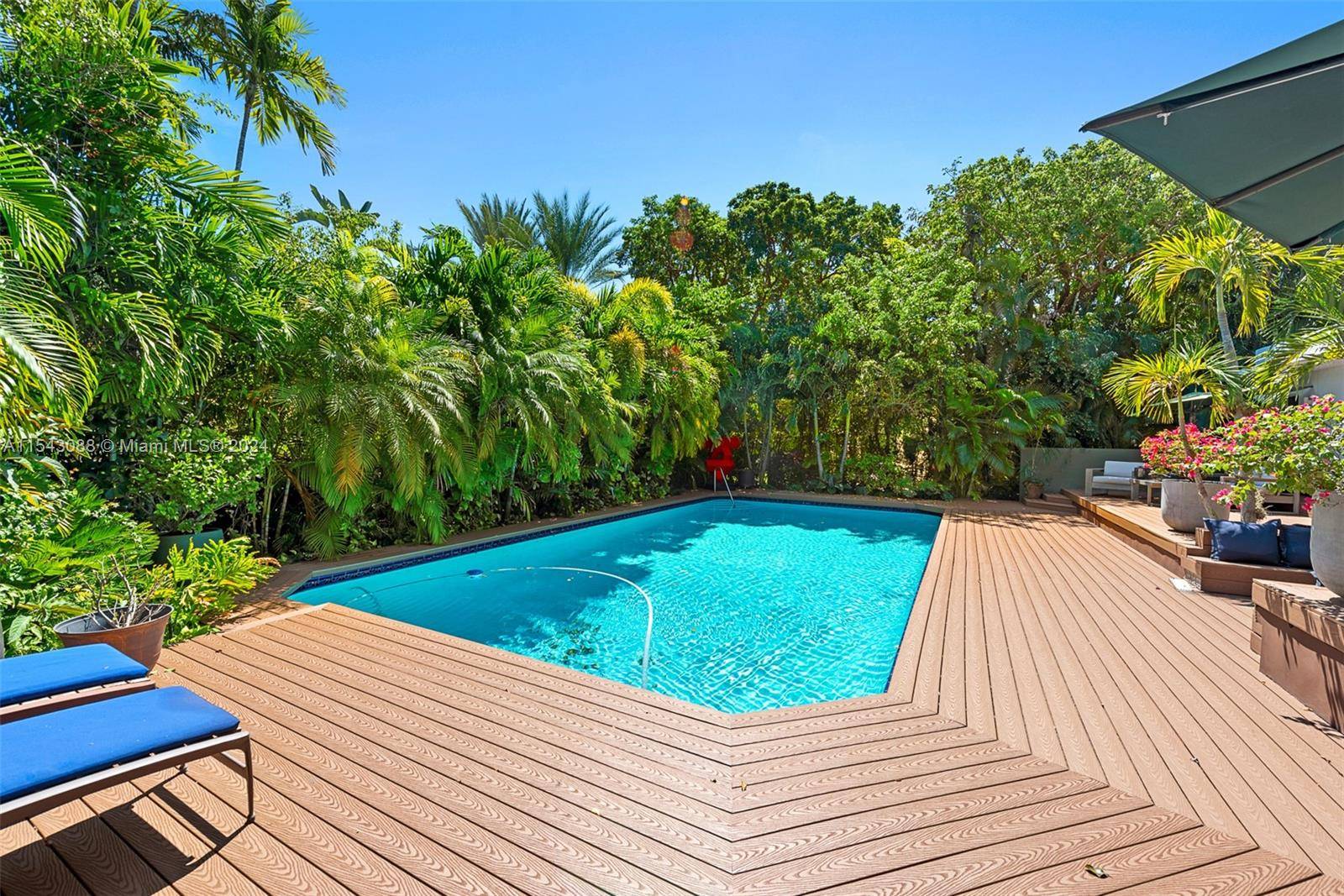 Newly Renovated Miami Beach Guard Gated Sunset Island 1 Mid Century beautiful home, Large Pool and spacious back patio.
