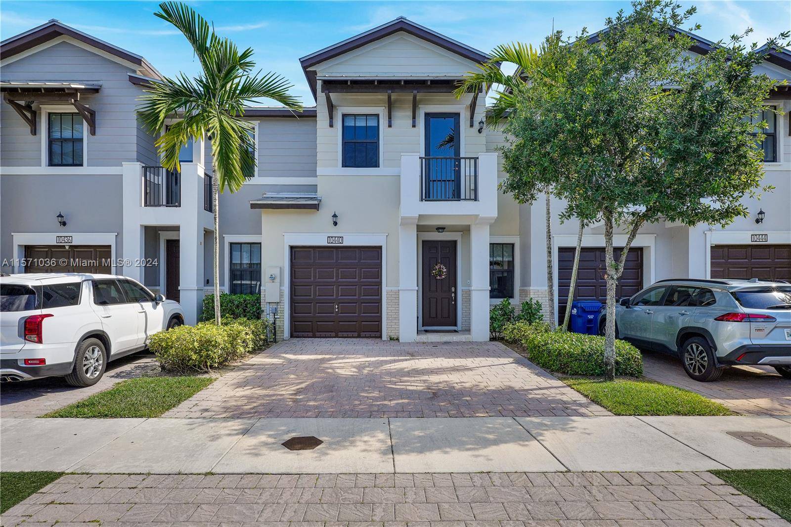 Introducing your dream home in Doral Cay 4 beds, 3 baths, with a convenient downstairs bedroom.