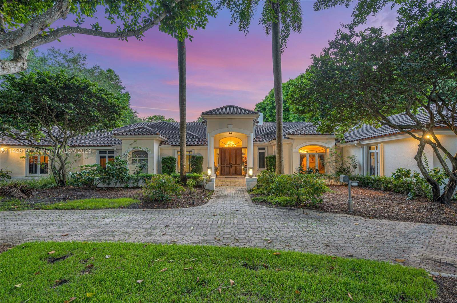 Luxurious one story estate located on the most charming and picturesque street in North Pinecrest.
