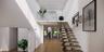 Staircase with a high ceiling, wood finished floors, and recessed lighting