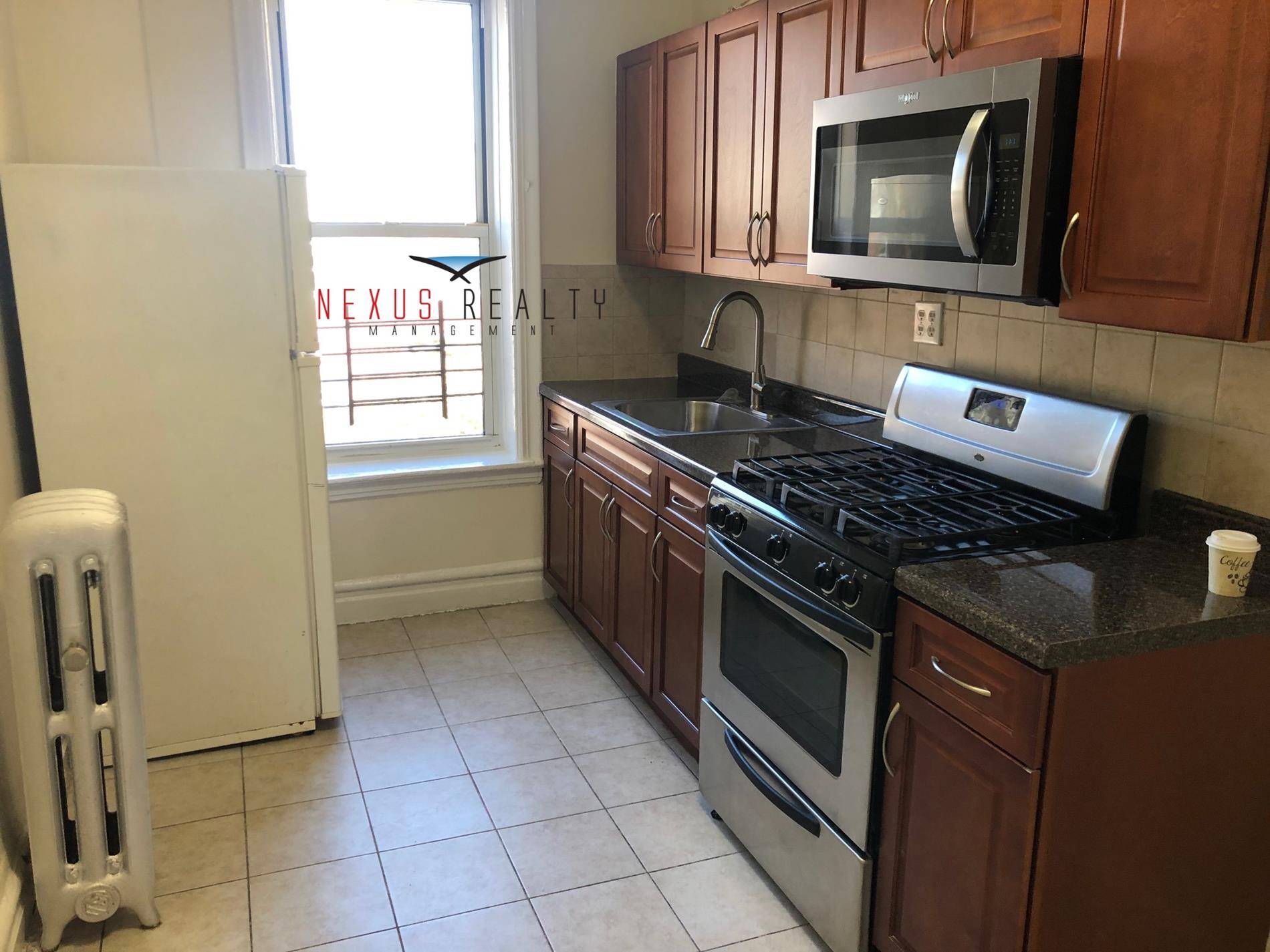 Spacious 2 Bedroom apartment in Astoria 23002 Spacious Bedrooms on the top floor in a 3 story private houseSunny eat in kitchen with stain steel appliances, microwave, and great cabinet ...