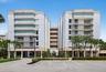 Exterior view showcasing the distinctive architecture of this oceanfront Jupiter community