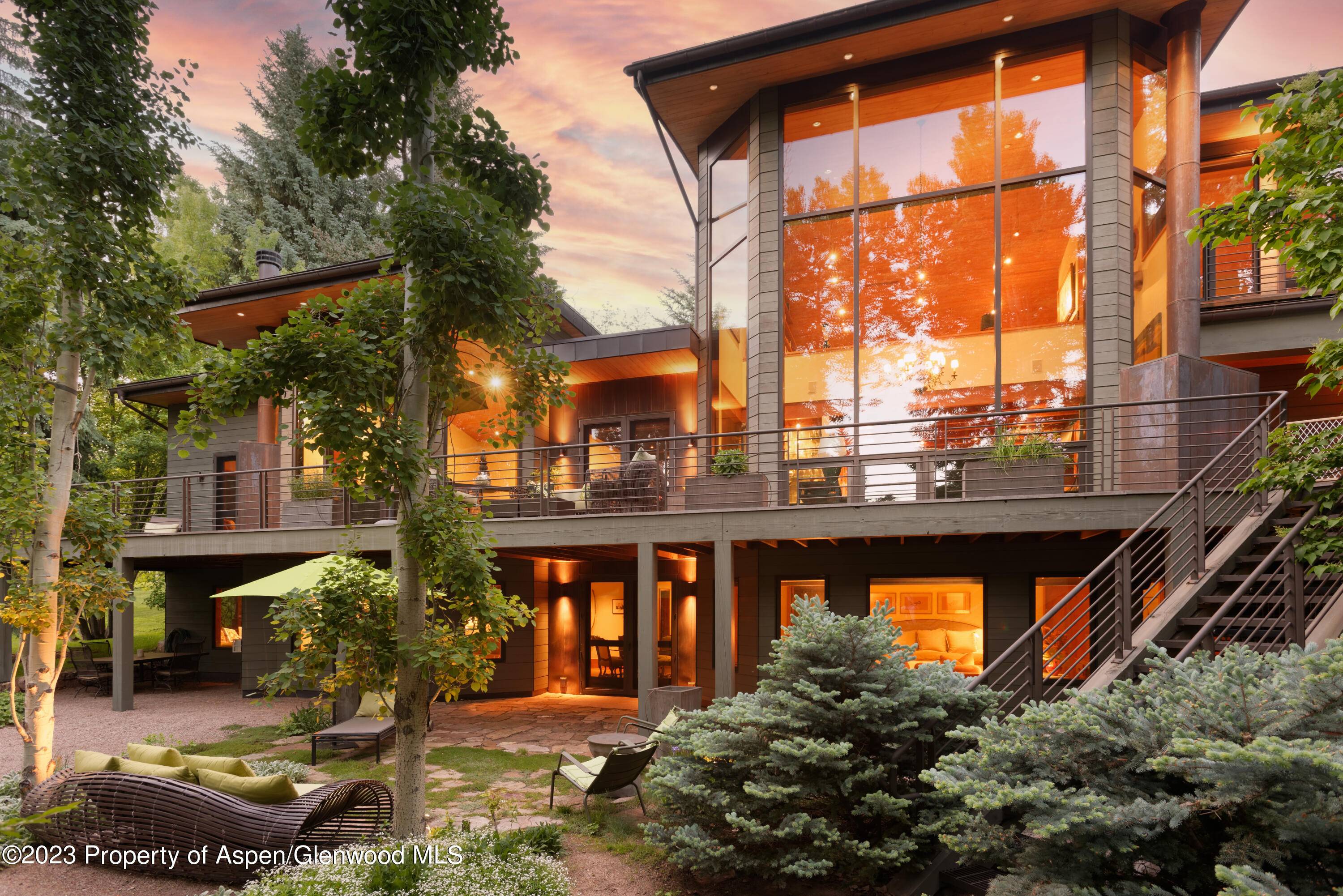 Escape to a beautiful home in serene West Aspen, offering views of Aspen Highlands.