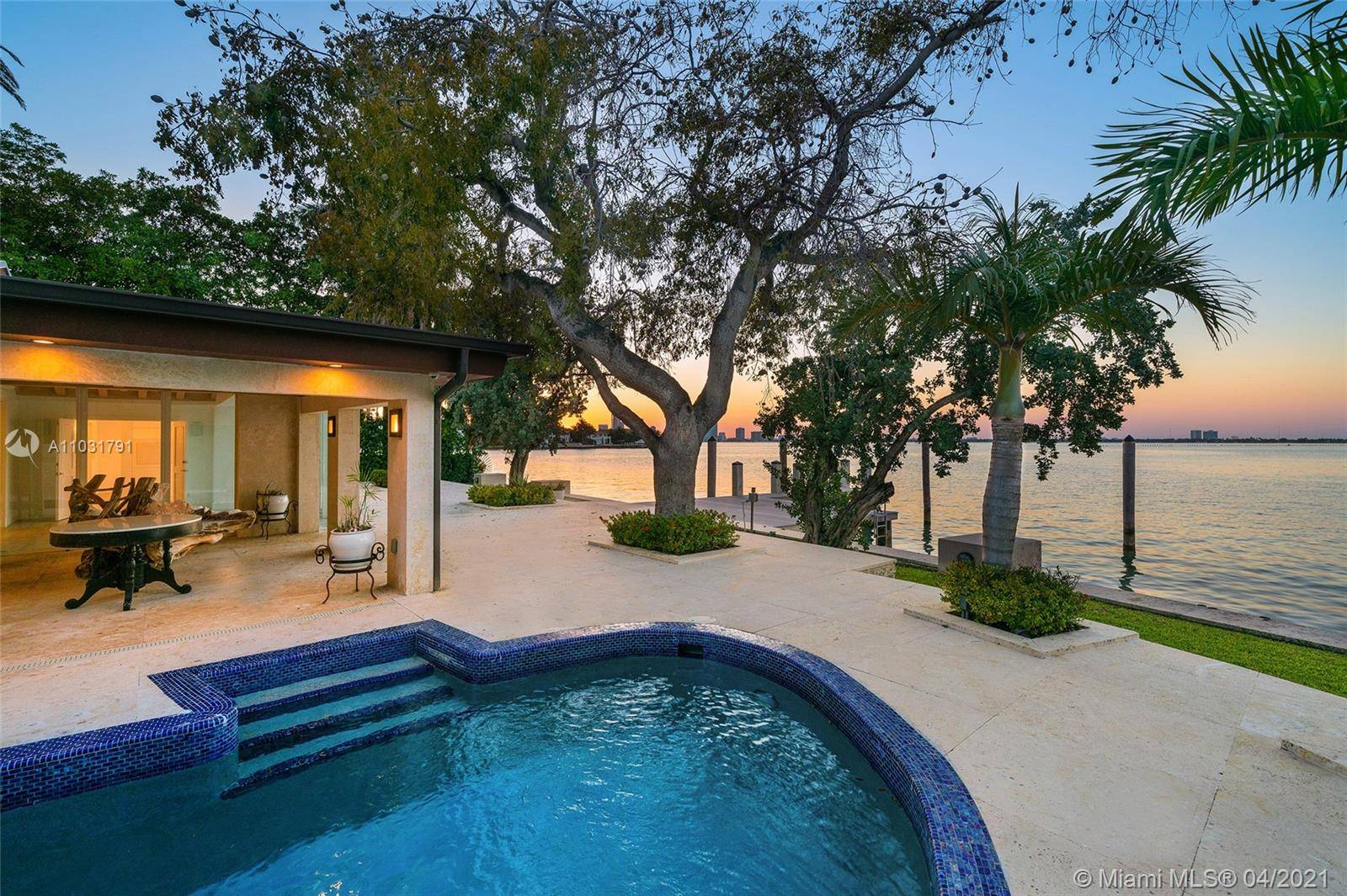 This Bayfront home is perfectly located on the coveted tip of the Venetian Islands.