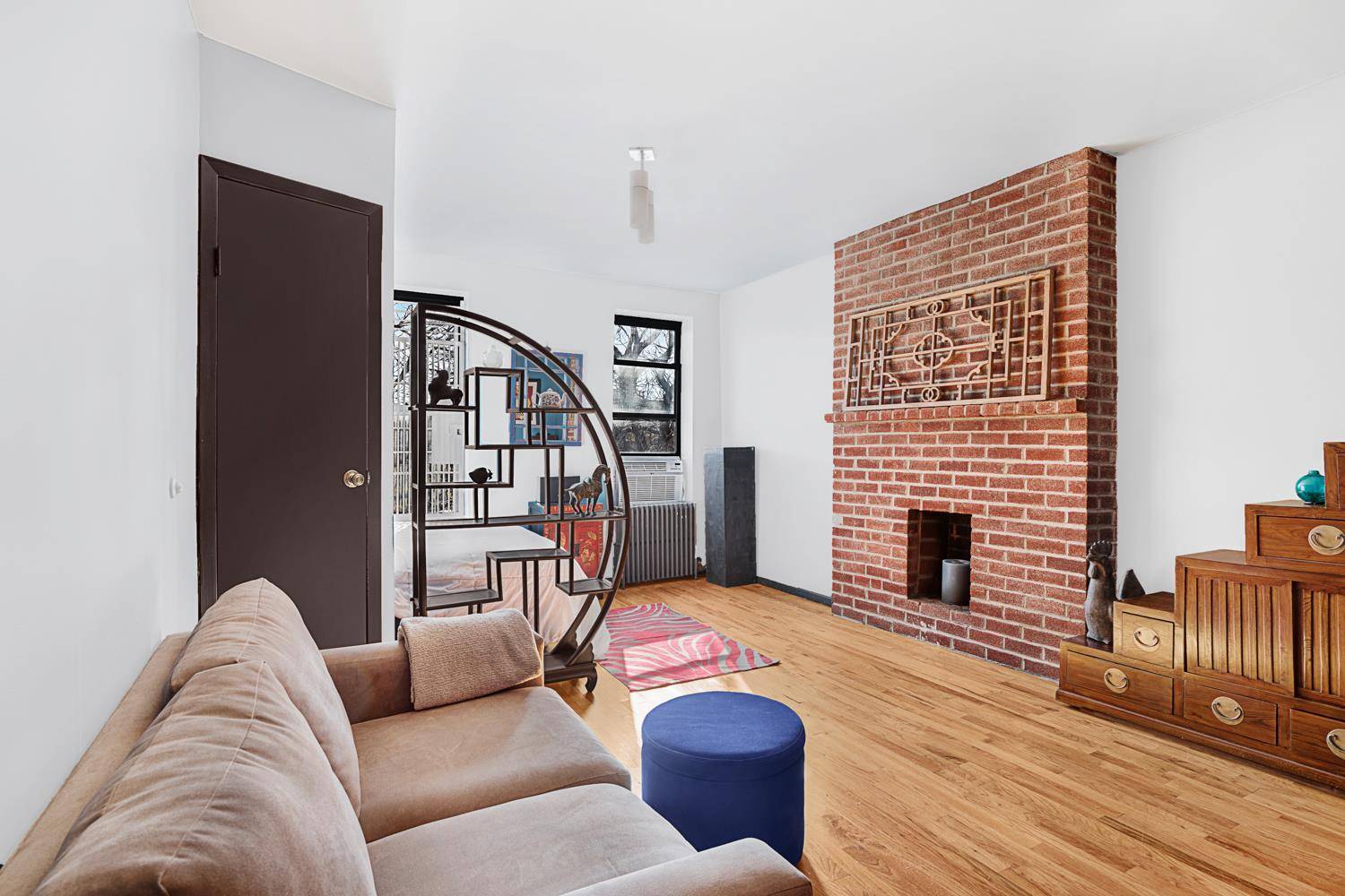 This large, walk up studio is located in the heart of the west village and features a custom built in arched bed nook offering a closet and overhead storage.