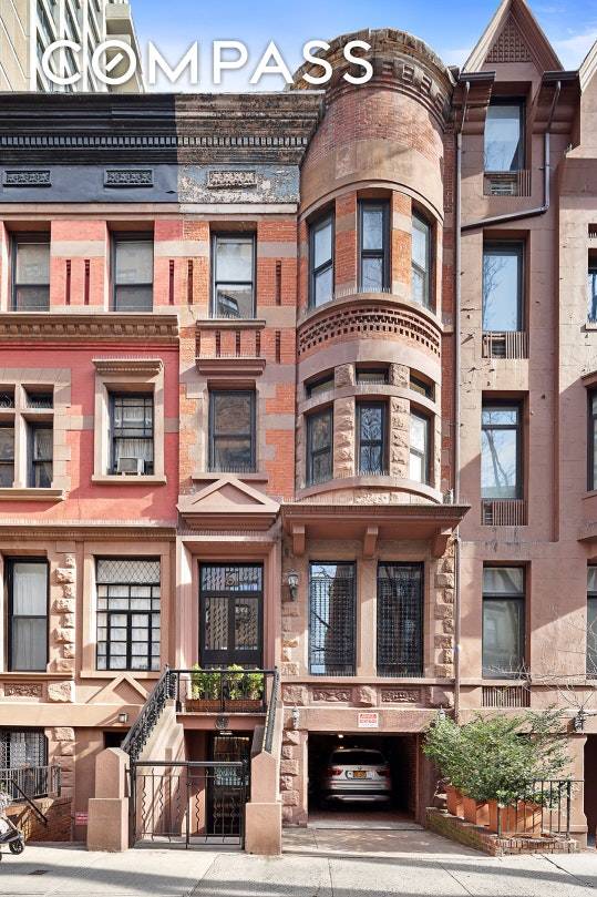 Rarely available turn of the century brownstone with private parking garage and double wide backyard !