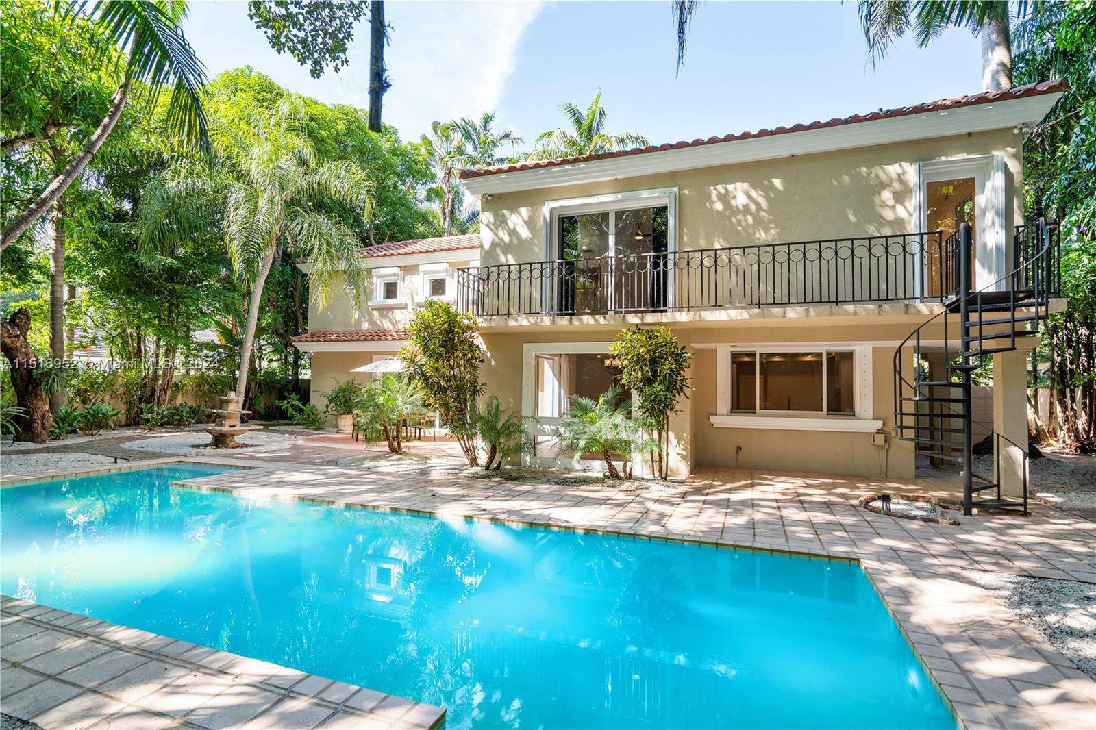 Nestled in the beautiful quiet neighborhood of South Coconut Grove, this gorgeous Mediterranean home is situated on a lush private 13, 000 Sq.