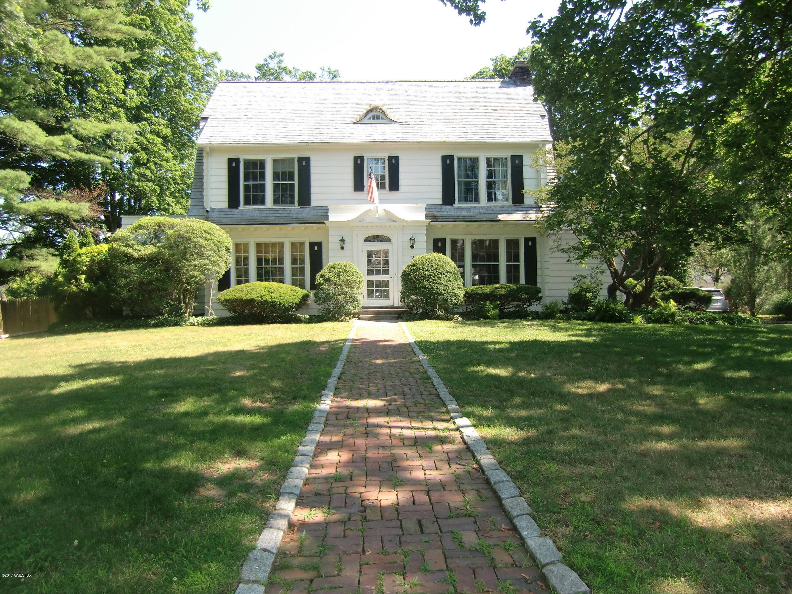 Updated Classic Colonial on private street in Old Greenwich with water access.