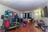Rec room with dark wood-style flooring